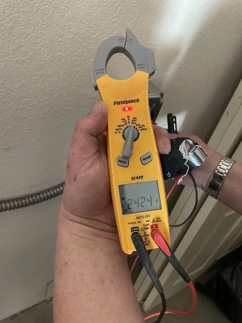 Voltage testing with clamp meter during Aluminum Wiring Replacement in Story City
